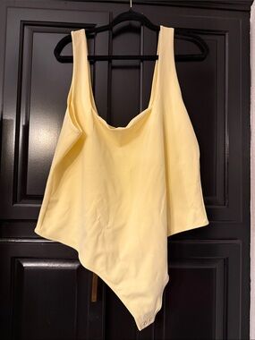Good American Pale Yellow Asymmetric Tank Bodysuit